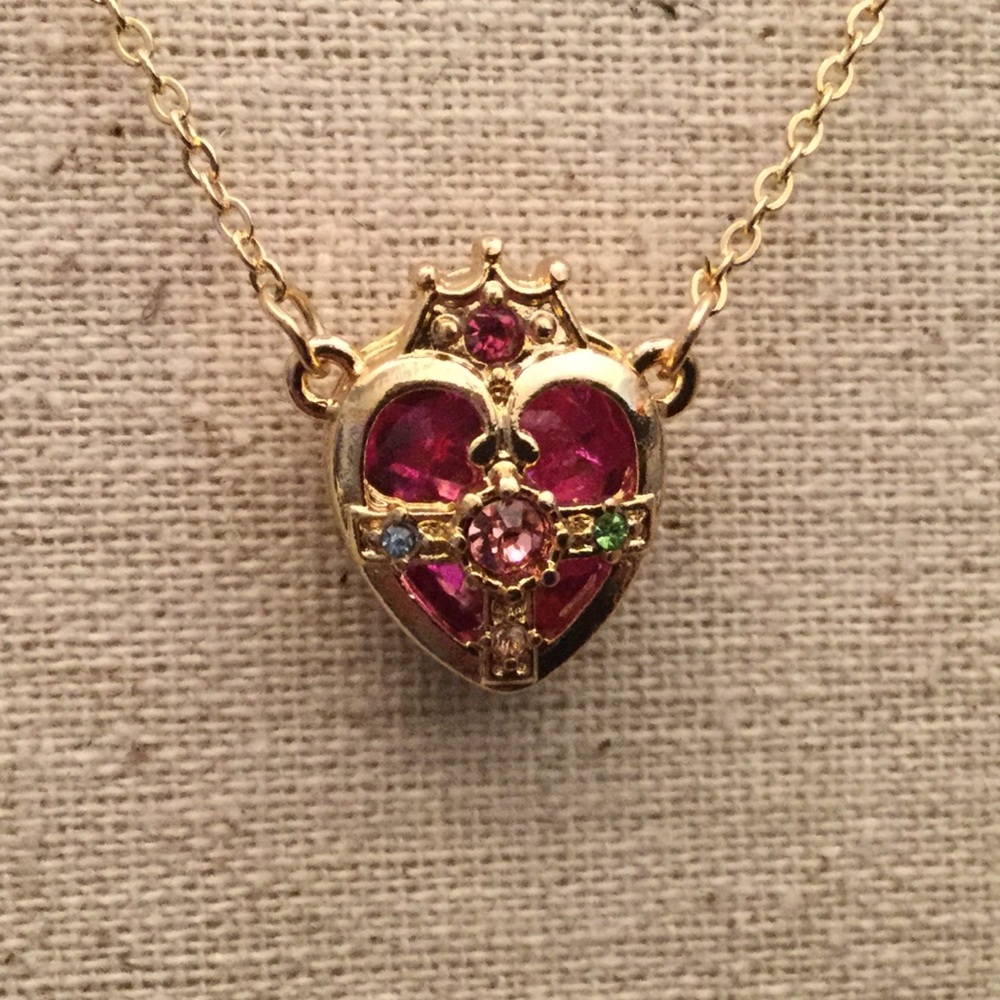 Heart with crown necklace in royal queen design.